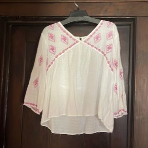 White and pink blouse